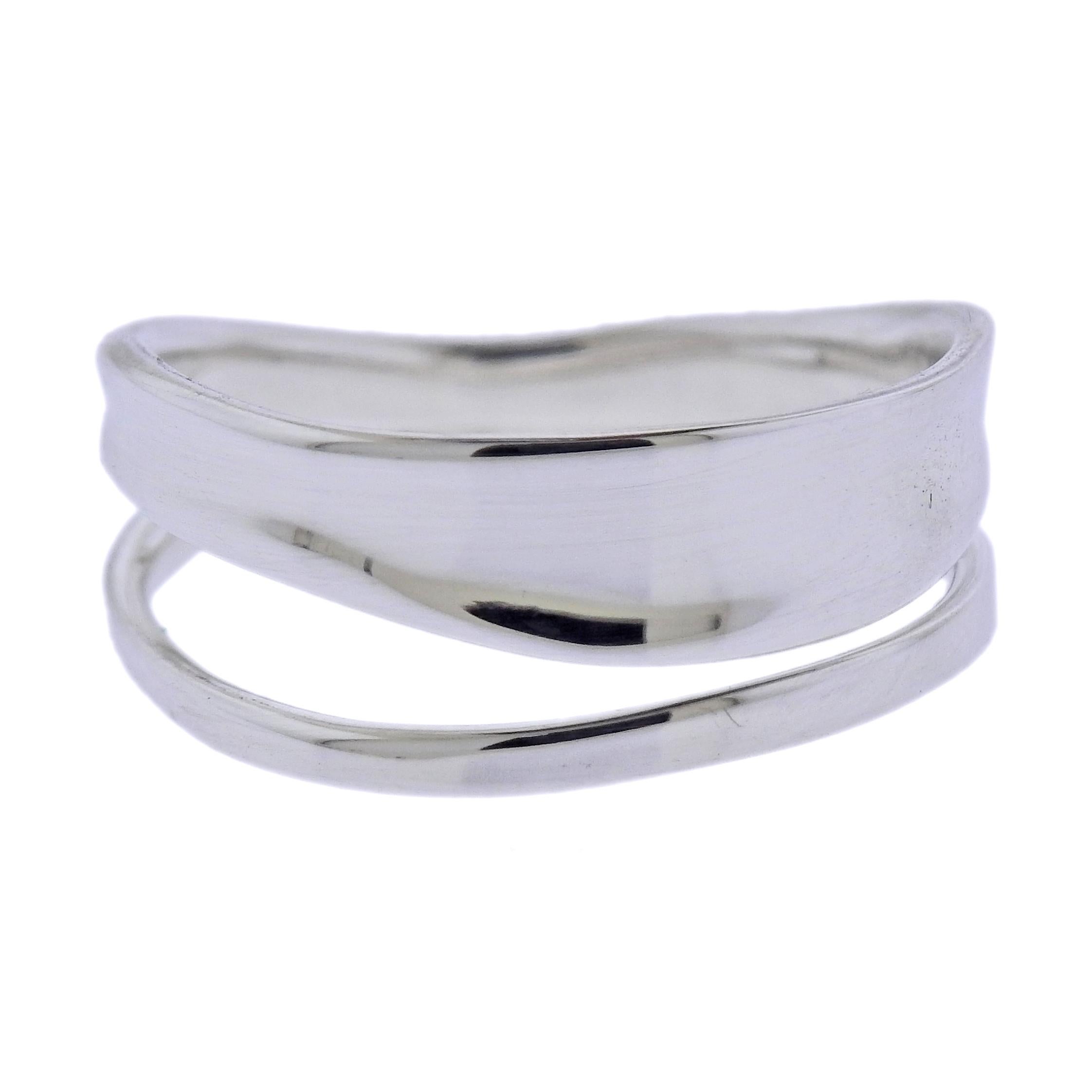 Brand new Georg Jensen sterling silver Marcia ring. Ring measures 9mm wide and available is following sizes: 56;57;58;59;60. Model# 3561100. Marked: GJ, 925 S, 618 B. Weight is 3.8 grams. 