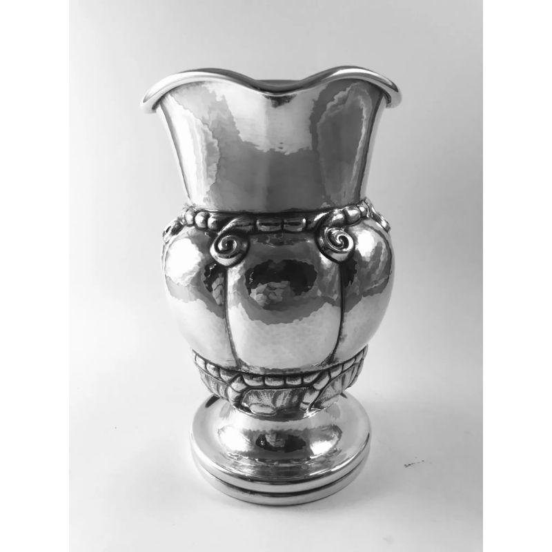 Sterling silver Georg Jensen pitcher with ebony handle, design #7 by Georg Jensen from circa 1907, this design often referred to as “Melon”.

Additional information:
Material: Sterling silver
Styles: Art Nouveau
Hallmarks: We currently have two of