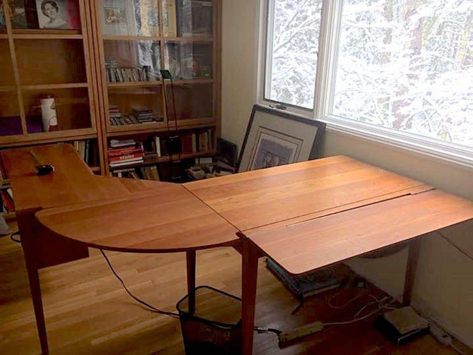 Mid Century Style Desk by Thomas Newhouse for Herman Miller, Danish Modern Design, Three Piece Cherry Wood Desk, in an L shaped design, with an additional flip-up leaf.
The desk has two half moon drop leaves. It measures 70