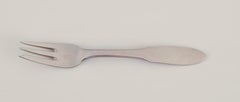Georg Jensen "Mitra". Set of nine cake forks. Stainless steel.
