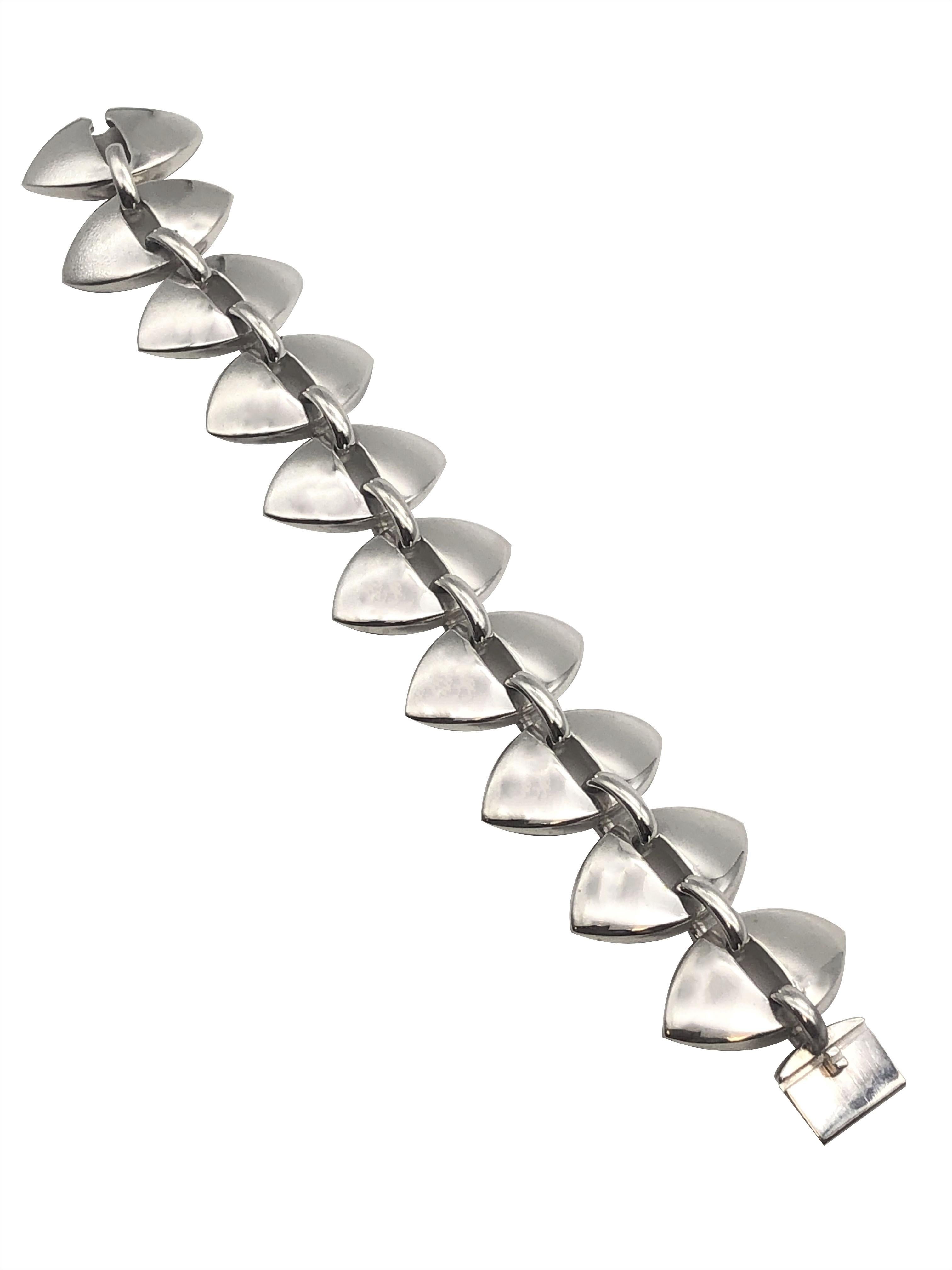 Circa 1950s Georg Jensen Denmark, Sterling Silver Bracelet # 106 by designer Nanna Ditzel, measuring 7 inches in length and 1 inch wide with solid links. 