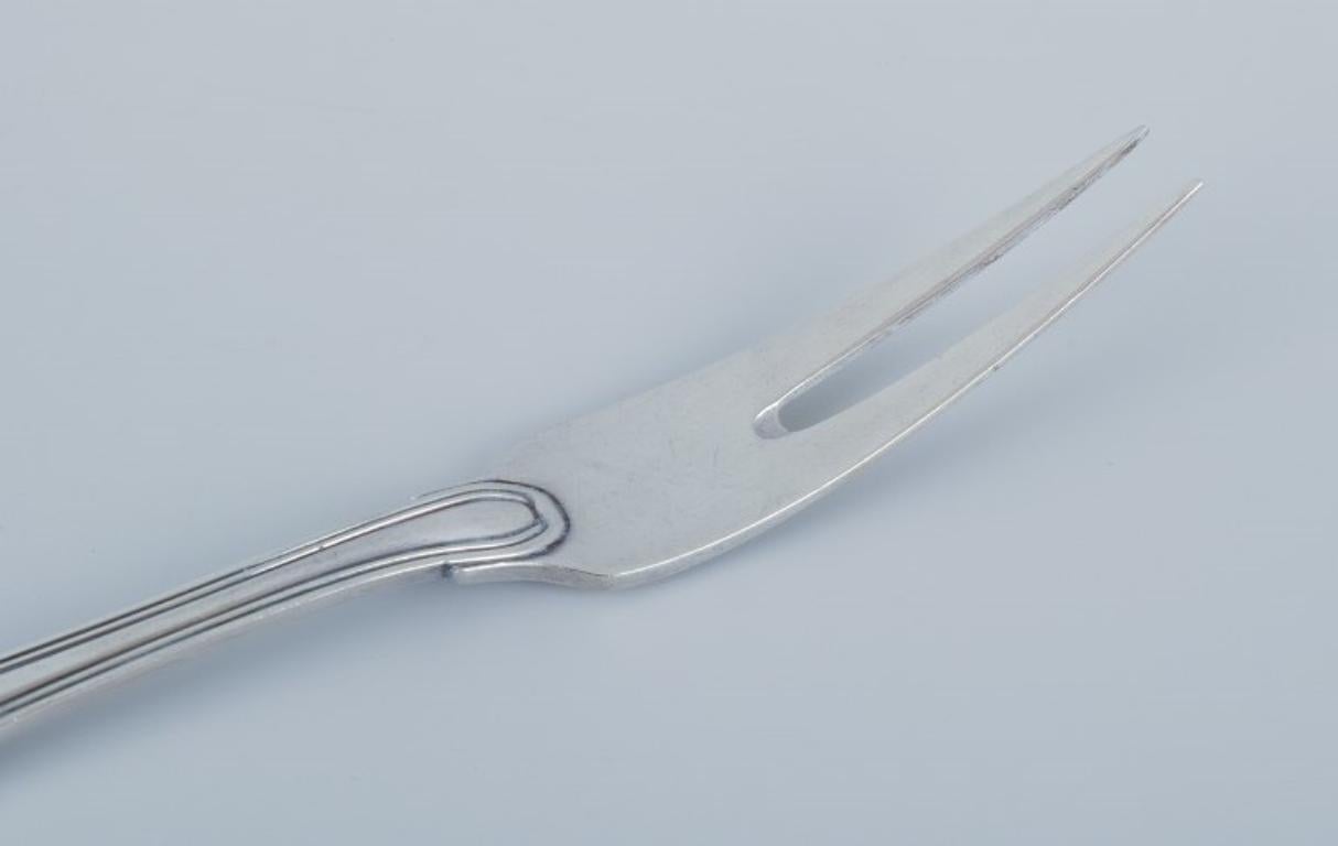 20th Century Georg Jensen Old Danish, cold meat fork in sterling silver.  For Sale