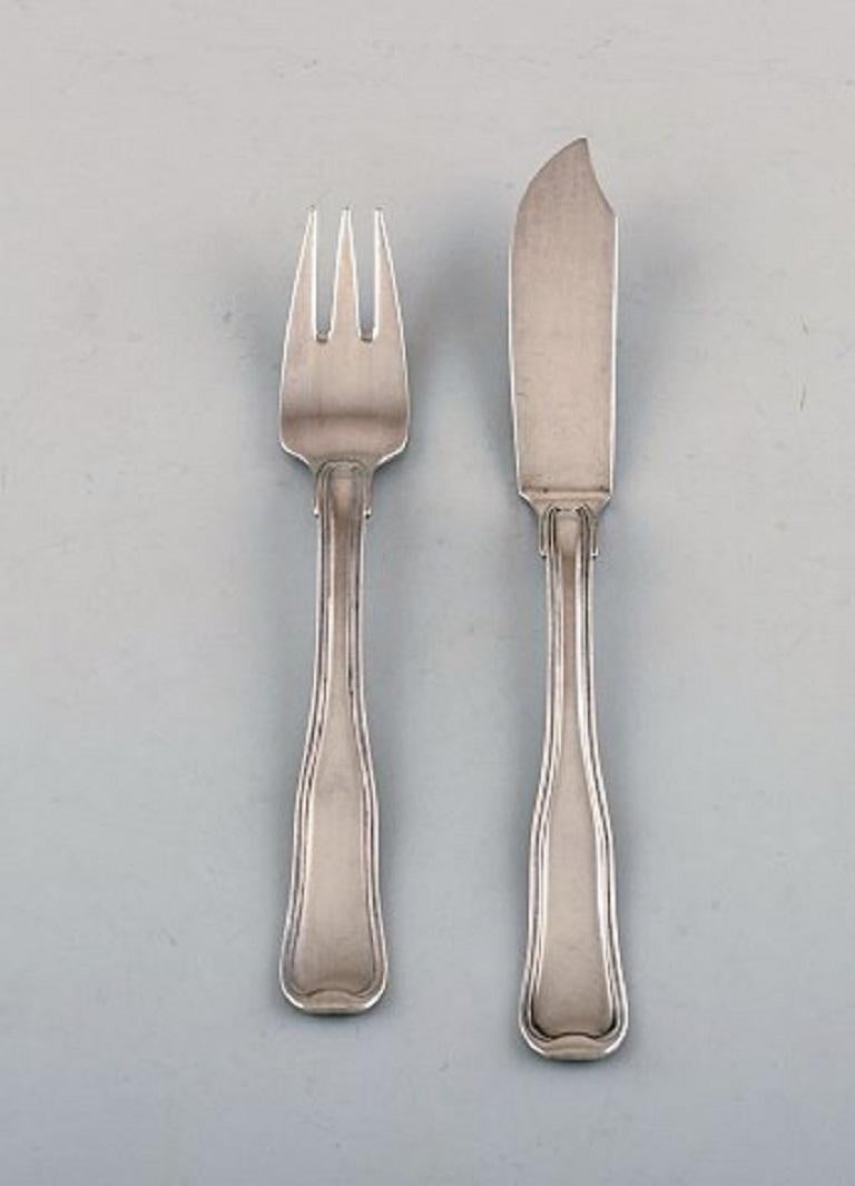 Georg Jensen old danish fish cutlery in sterling silver. 
Complete for four people.
In very good condition.
Fish knife measures: 20,2 cm.
Stamped.
Large selection of Georg Jensen old danish in stock.






 