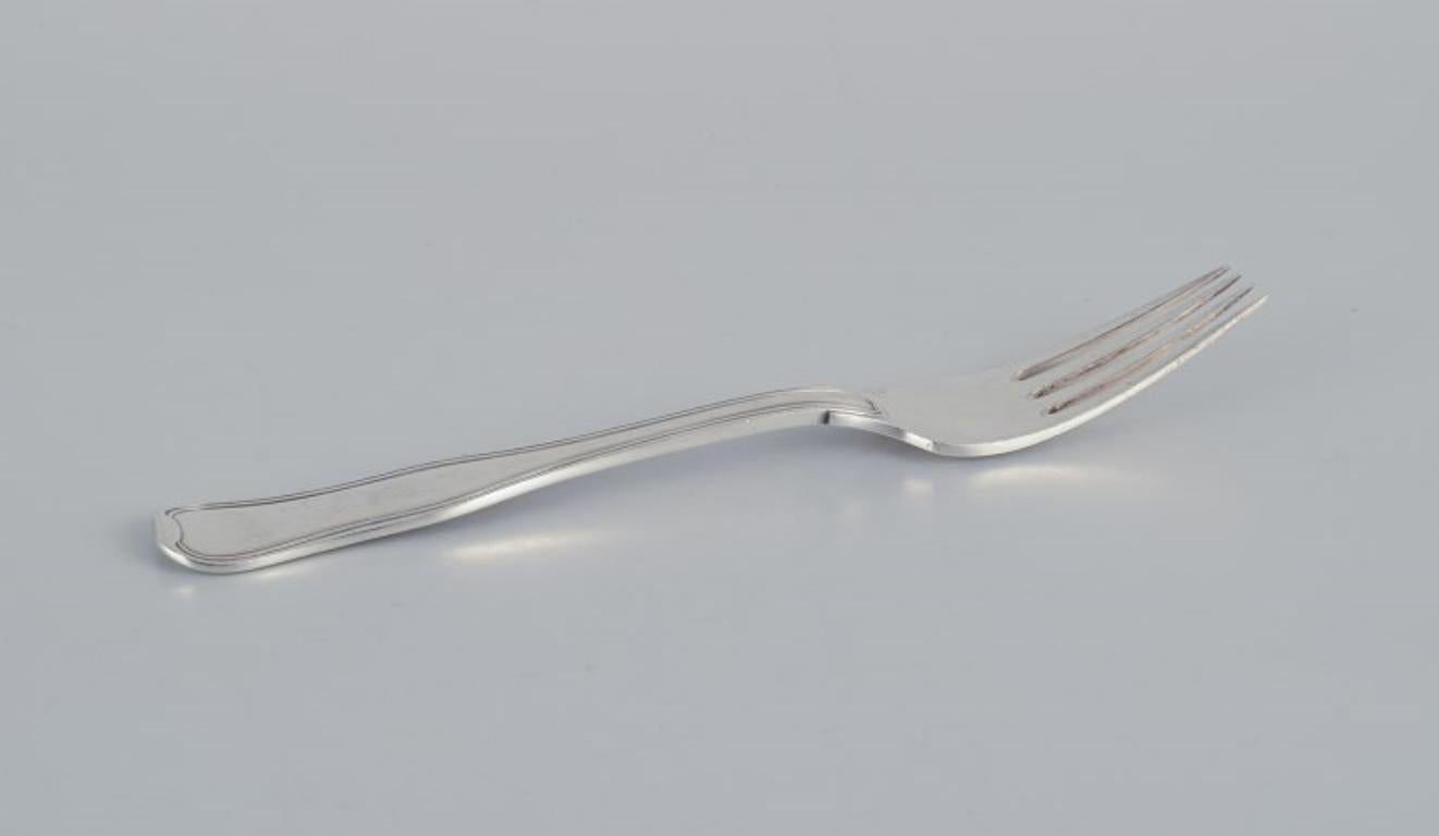 Georg Jensen Vecchio Danese. Quattro forchette da pranzo in argento sterling.
Marchio di garanzia post-1944.
In ottime condizioni.
Dimensioni: L 17,0 cm.