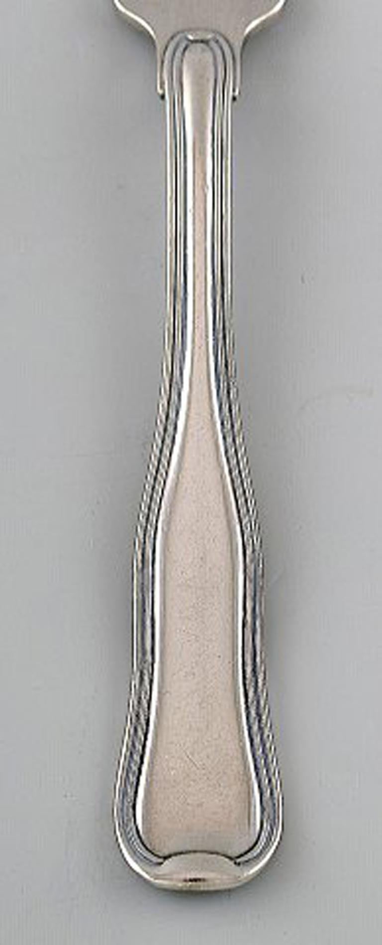 Georg Jensen Old Danish lunch fork. 7 pieces in stock.
Stamped.
In very good condition.
Measures: 17 cm.