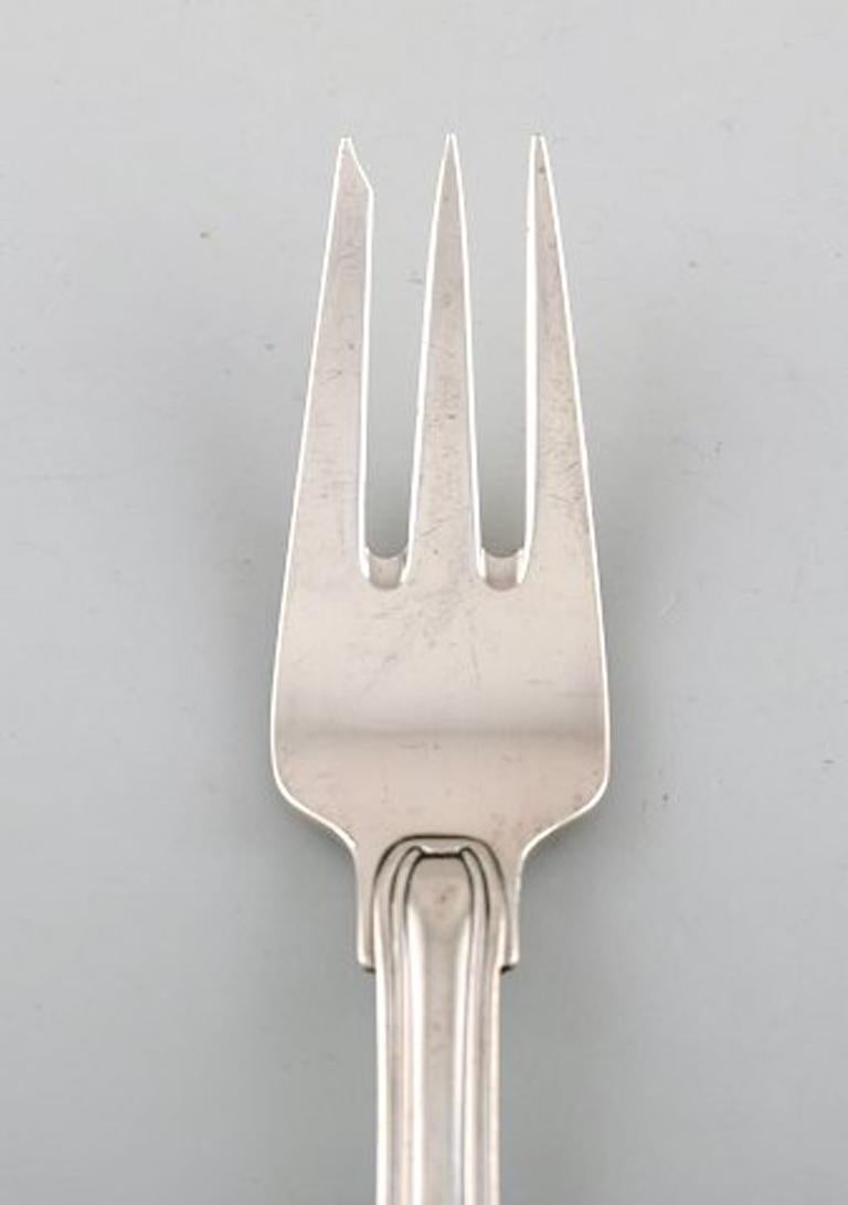 Georg Jensen Old Danish pastry fork in sterling silver. Three pieces in stock.
In very good condition.
Measures: 14.5 cm.
Stamped.
 