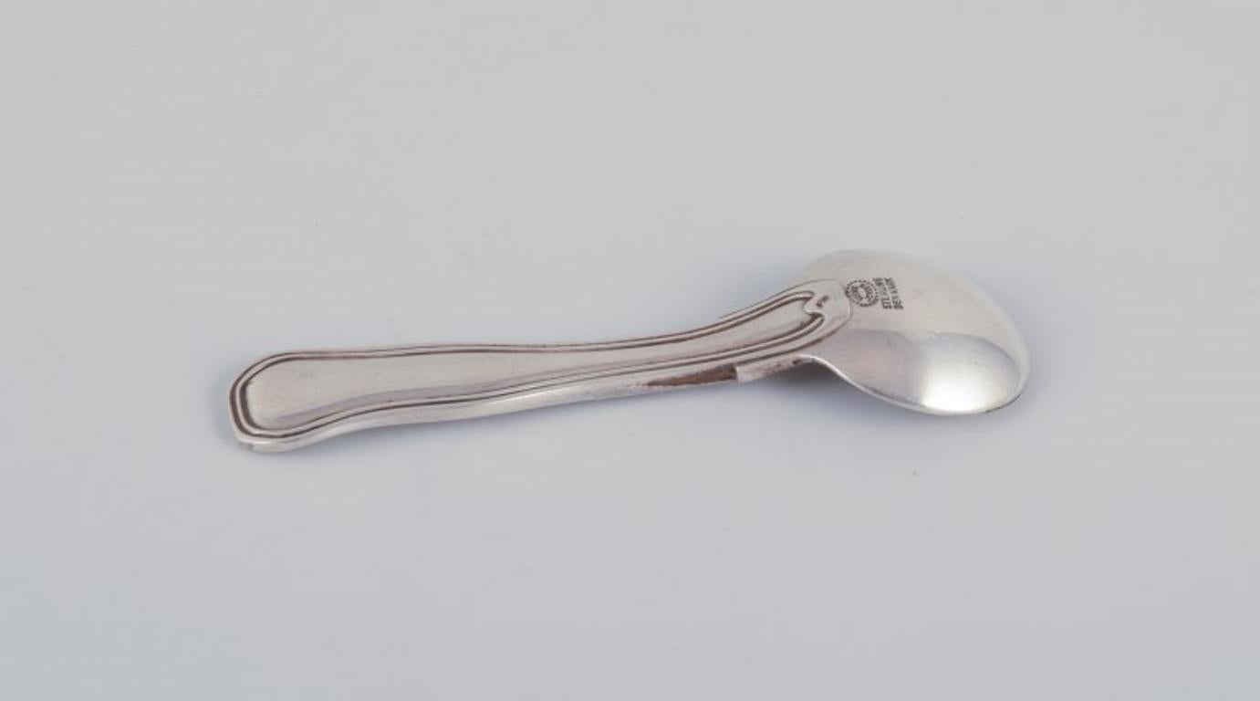 20th Century Georg Jensen. Old Danish salt spoon in sterling silver. For Sale