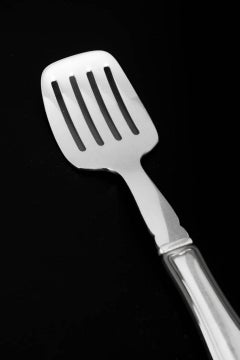 Georg Jensen. Old Danish sardine fork in stainless steel and sterling silver.