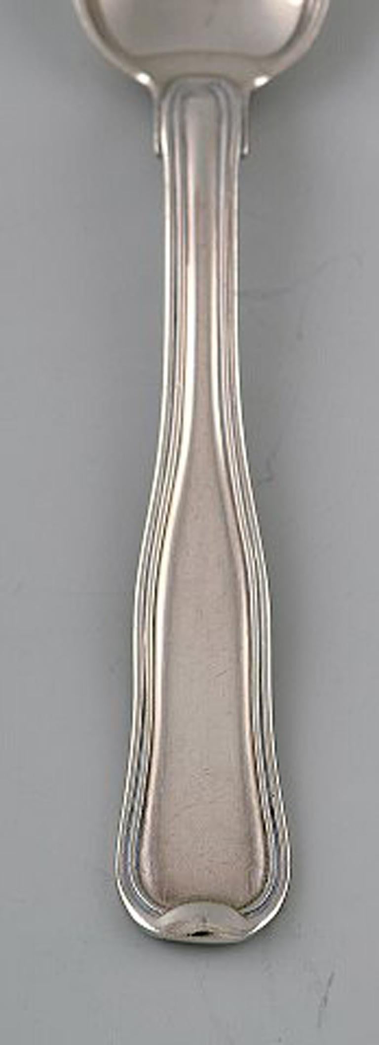 Georg Jensen Old Danish service. Tea spoon. 7 pcs in stock.
Stamped.
In very good condition.
Measures: 12.7 cm.
