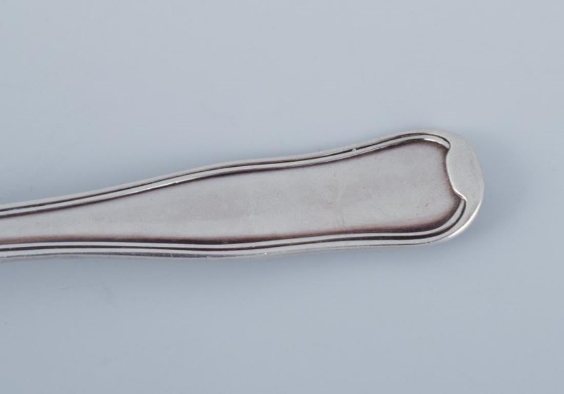 Georg Jensen Old Danish, sugar spoon in sterling silver. Stamped with 1945-1951  In Excellent Condition For Sale In Copenhagen, DK