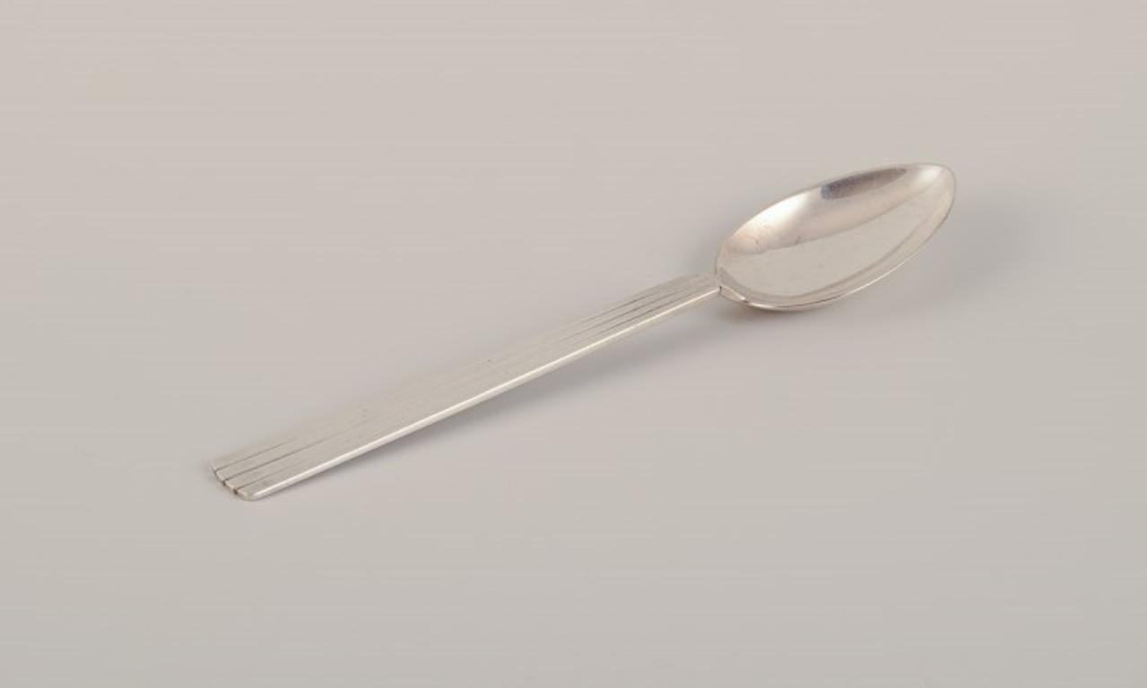 Scandinavian Modern Georg Jensen, pair of Bernadotte dinner spoons in sterling silver. For Sale