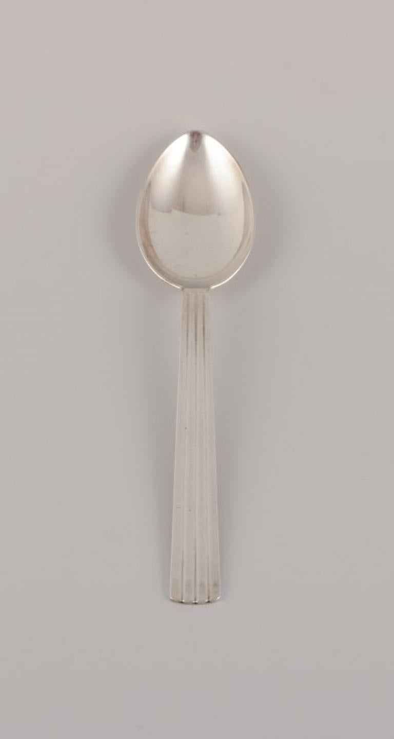 20th Century Georg Jensen, pair of Bernadotte dinner spoons in sterling silver. For Sale