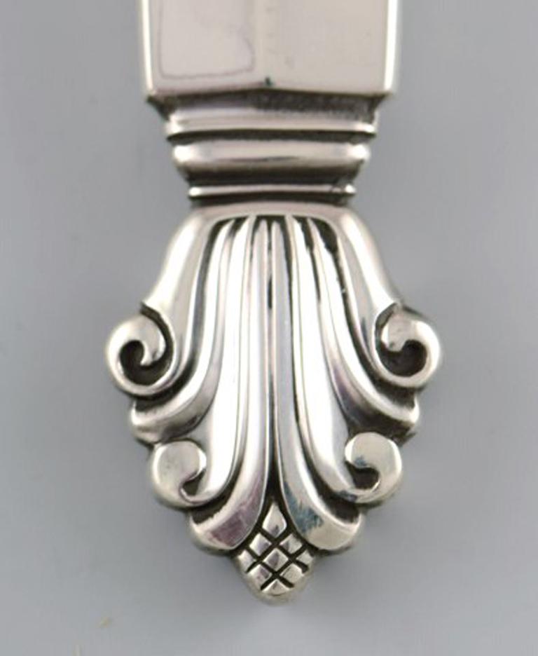 Georg Jensen, pattern acanthus. Designed by Johan Rohde.
Serving spoon sterling silver / stainless steel.
Measures: Length 23.5 cm.
In very good condition.
Stamped.