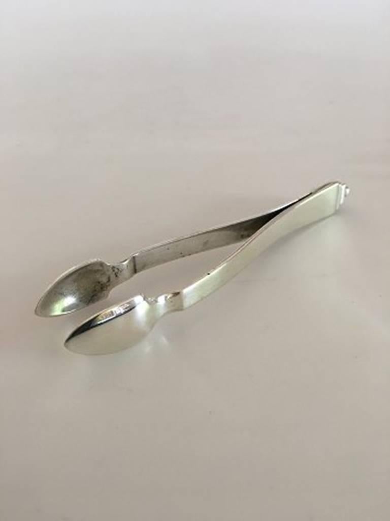 Georg Jensen Pyramid 830 Silver Sugar Tongs from 1920s. Measures 11 cm / 4 21/64 in.