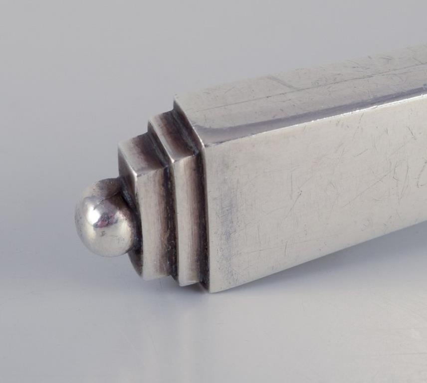 Danese Piramide di Georg Jensen. Apribottiglie in argento e acciaio inossidabile. in vendita