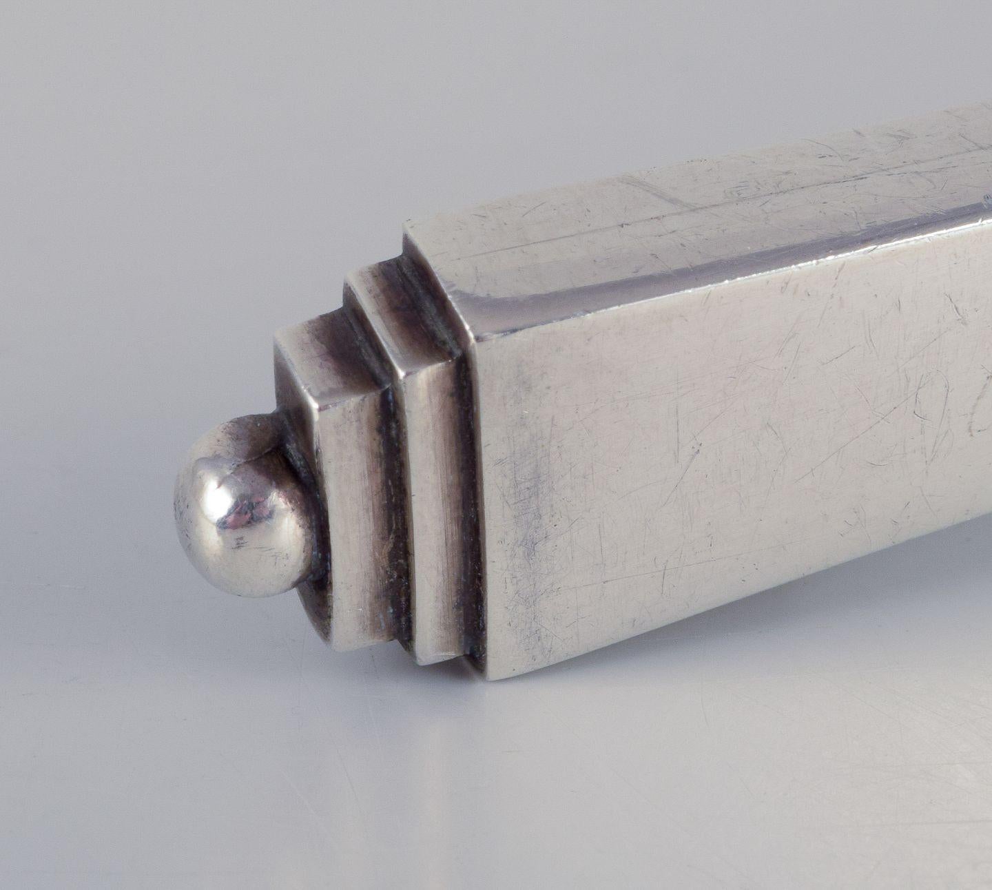 Danese Piramide di Georg Jensen. Apribottiglie in argento e acciaio inossidabile. in vendita