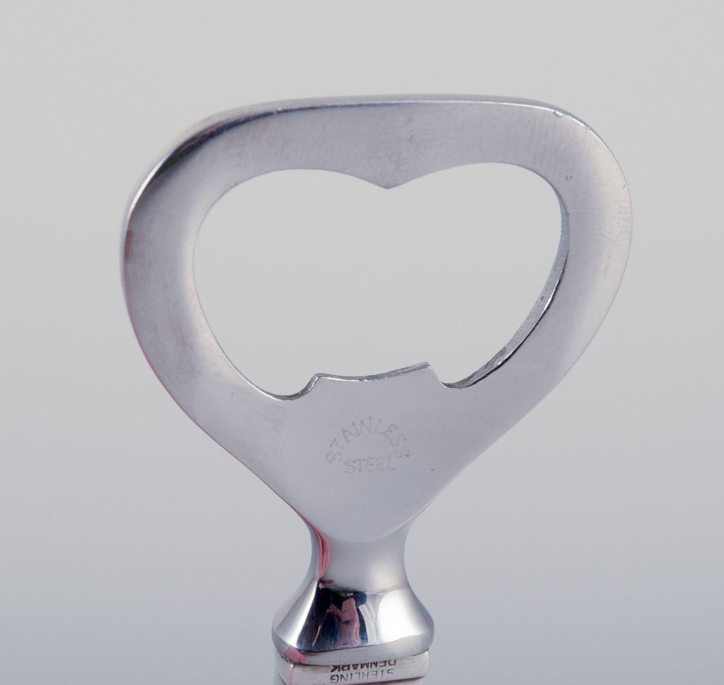 XX secolo Piramide di Georg Jensen. Apribottiglie in argento e acciaio inossidabile. in vendita
