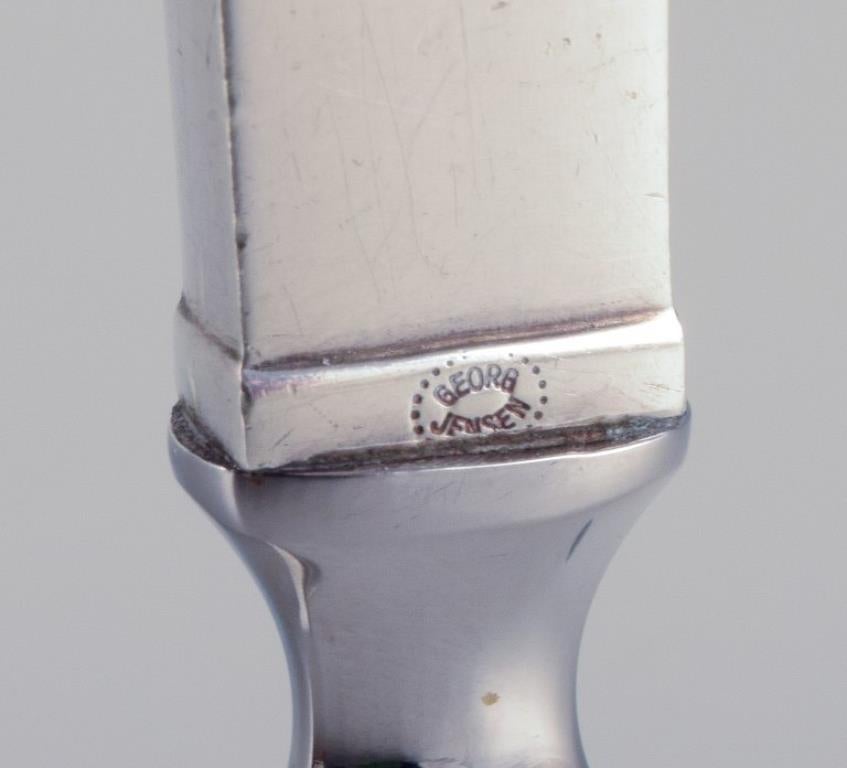Argento 925 Piramide di Georg Jensen. Apribottiglie in argento e acciaio inossidabile. in vendita