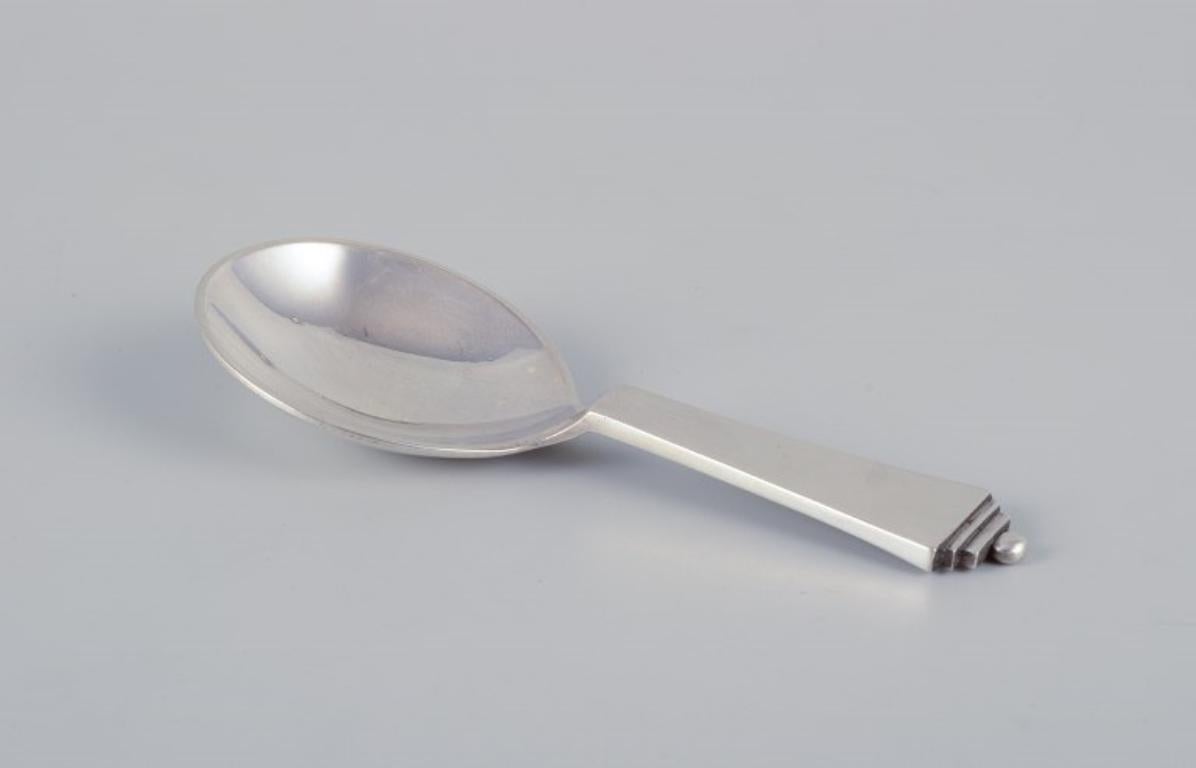 Art Deco Georg Jensen Pyramid compote spoon in sterling silver. 1915-1932 hallmark. For Sale