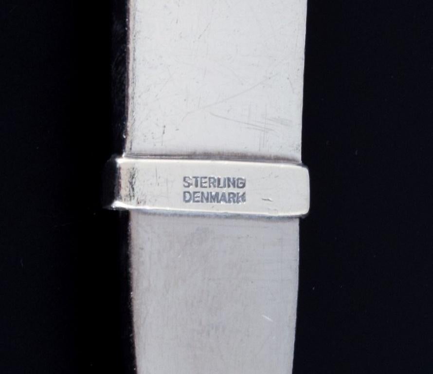 XX secolo Georg Jensen, Piramide. Cucchiaio da insalata in argento sterling e acciaio inossidabile. in vendita