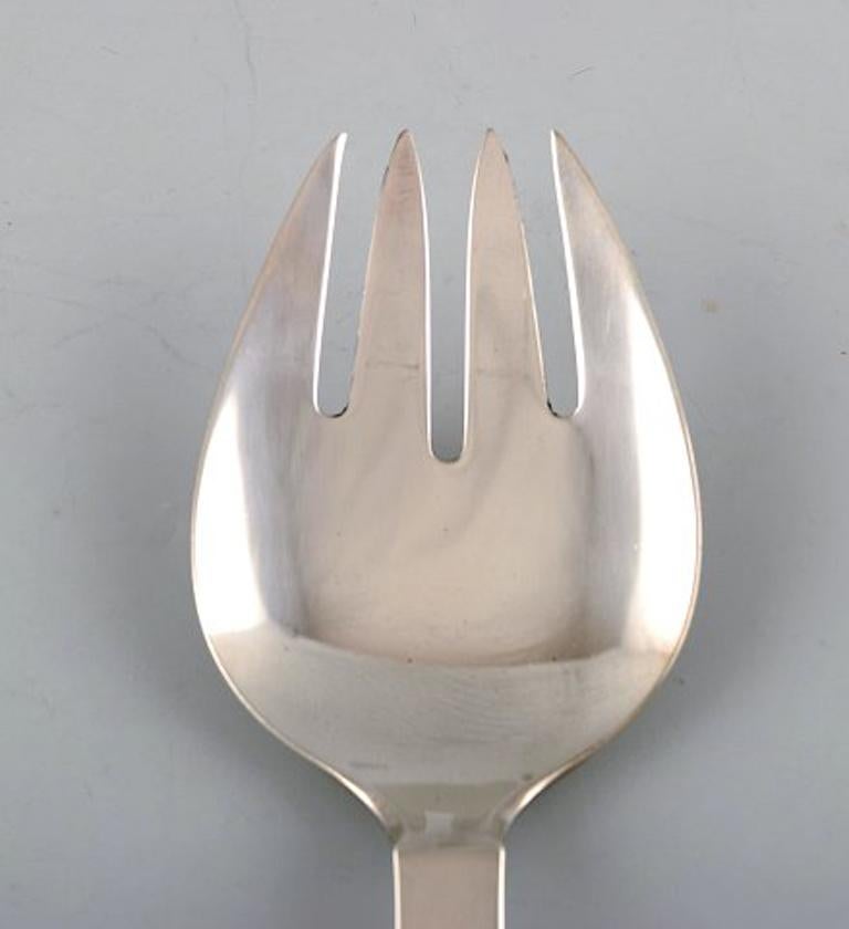 Georg Jensen Pyramid serving cutlery in sterling silver.
Designed by Harald Nielsen.
In perfect condition.
Measures: 25 cm.
Stamped.
In very good condition.