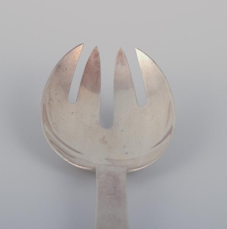 Art Deco Georg Jensen Pyramid serving fork in sterling silver.. For Sale