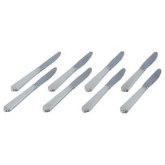Georg Jensen Pyramid, set of eight long-handled dinner knives.