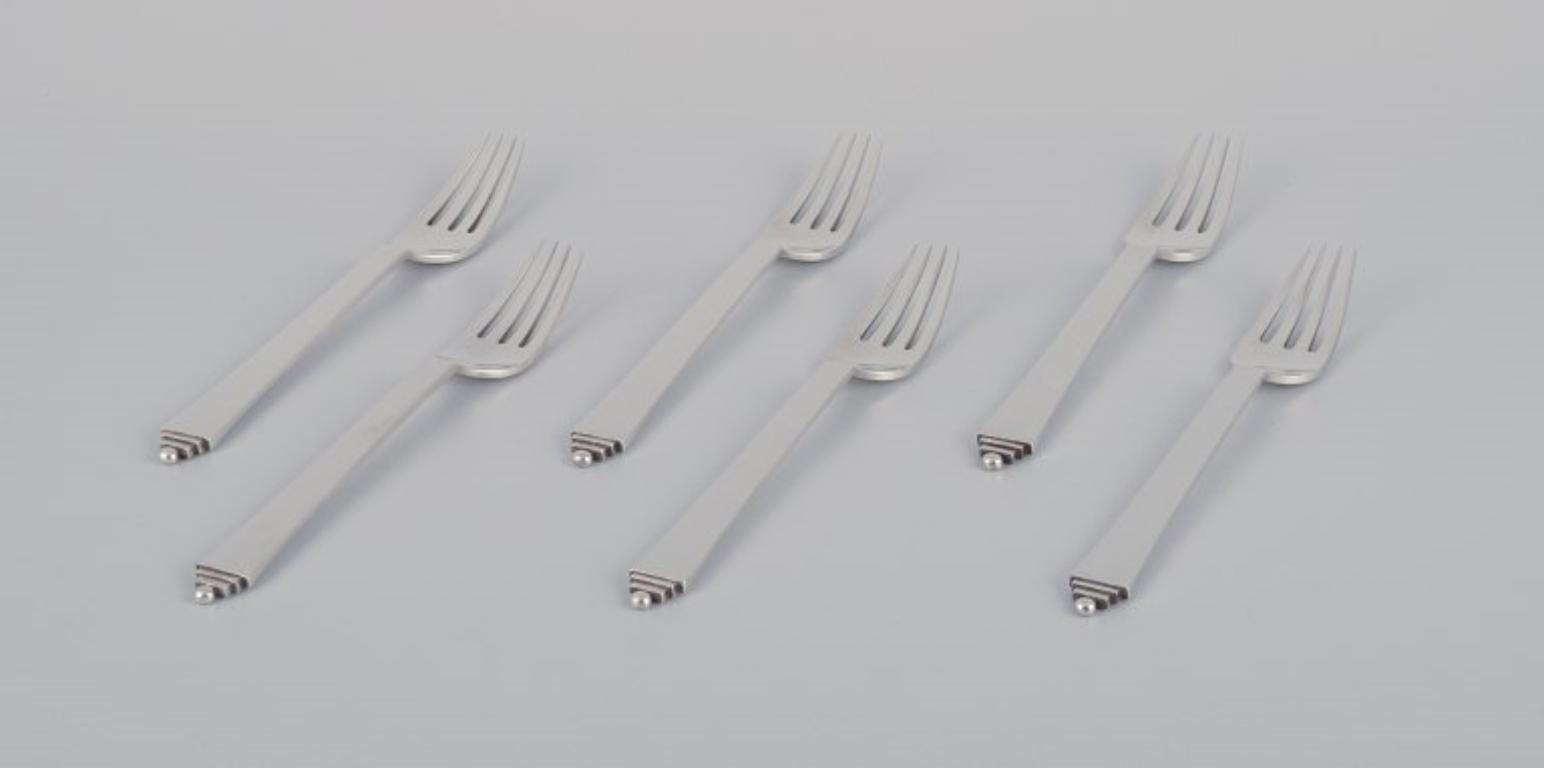 Georg Jensen Pyramid, set of six dinner forks in sterling silver.
Hallmark: 1933-1944.
In perfect condition.
Dimensions: L 18.1 cm.