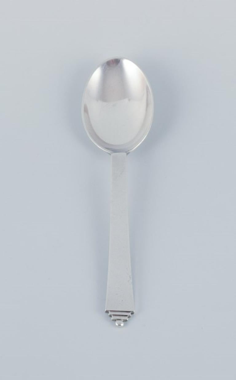 Georg Jensen Pyramid, a set of twelve dessert spoons in sterling silver.
With a hallmark after 1944.
In excellent condition.
Dimensions: 16.5 cm.