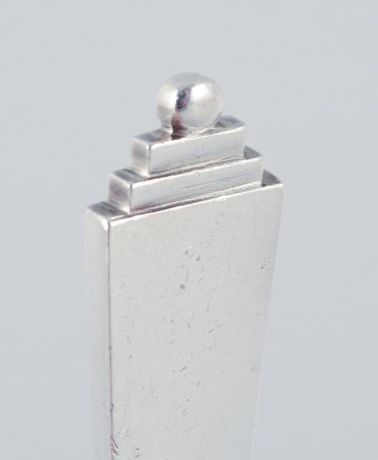 Danish Georg Jensen Pyramid, set of twelve dessert spoons in sterling silver. 