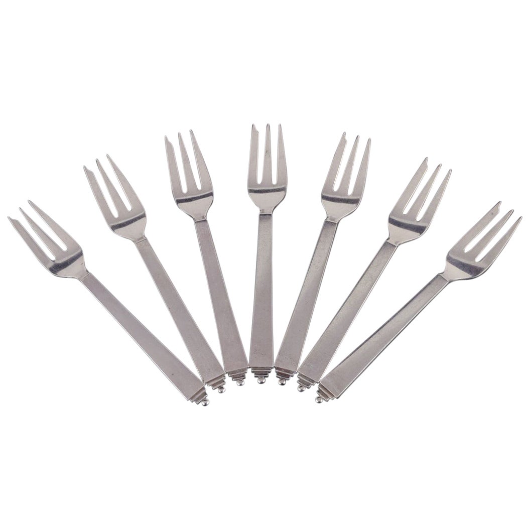 Georg Jensen Pyramide. Sieben Kuchengabeln aus Sterlingsilber.