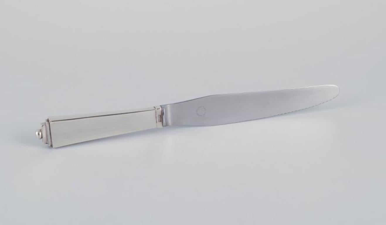 Danish Georg Jensen Pyramide. Art Deco dinner knife with a long handle. For Sale