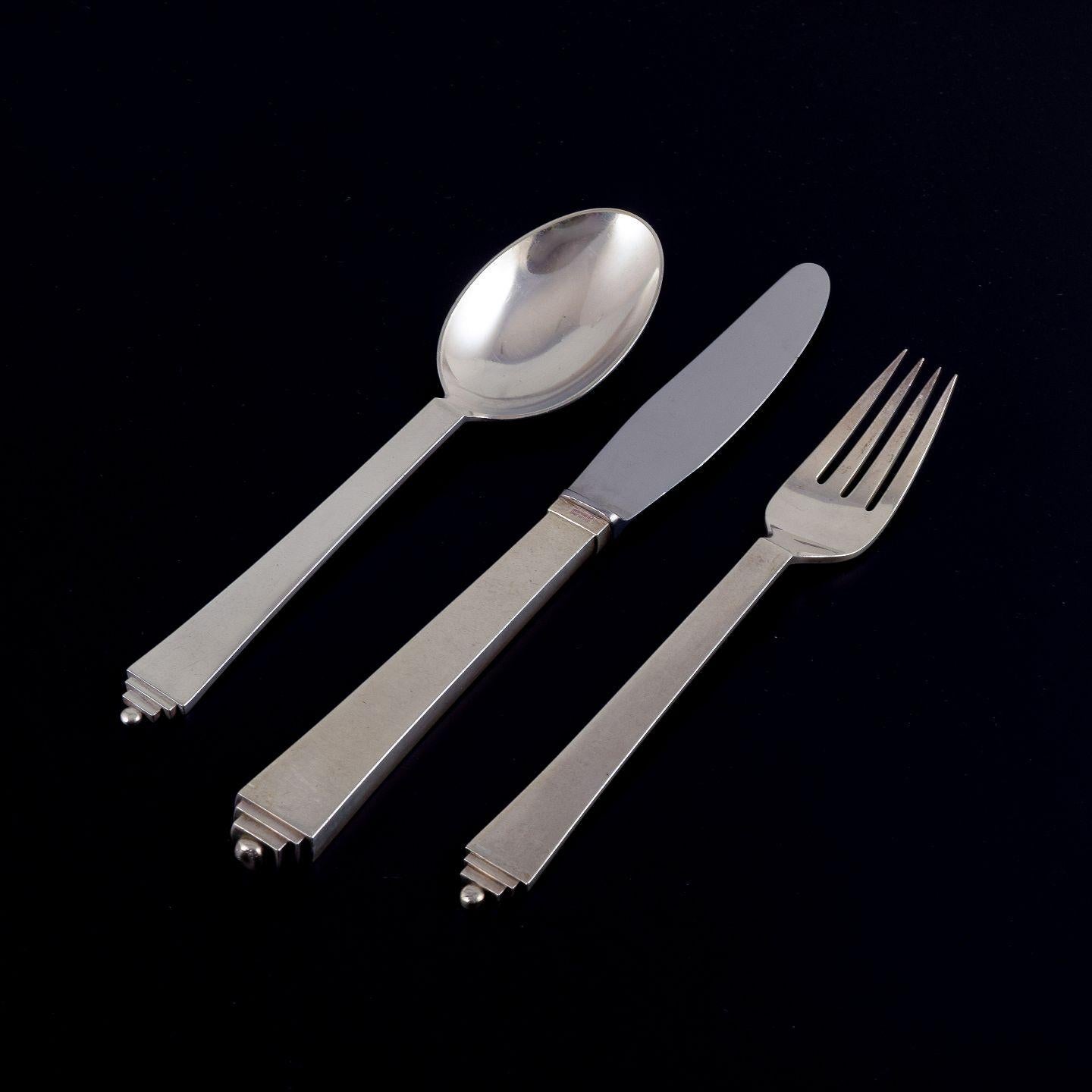 PRE-OWNED GOODS ARE EXEMPT FROM IMPORT TARIFFS FOR U.S., UK, AUSTRALIAN & CANADIAN CUSTOMERS.   
THEREFORE, NO IMPORT TARIFFS WILL BE APPLICABLE TO YOUR PURCHASE. 

Georg Jensen Pyramide.
Complete six-person dinner service in sterling