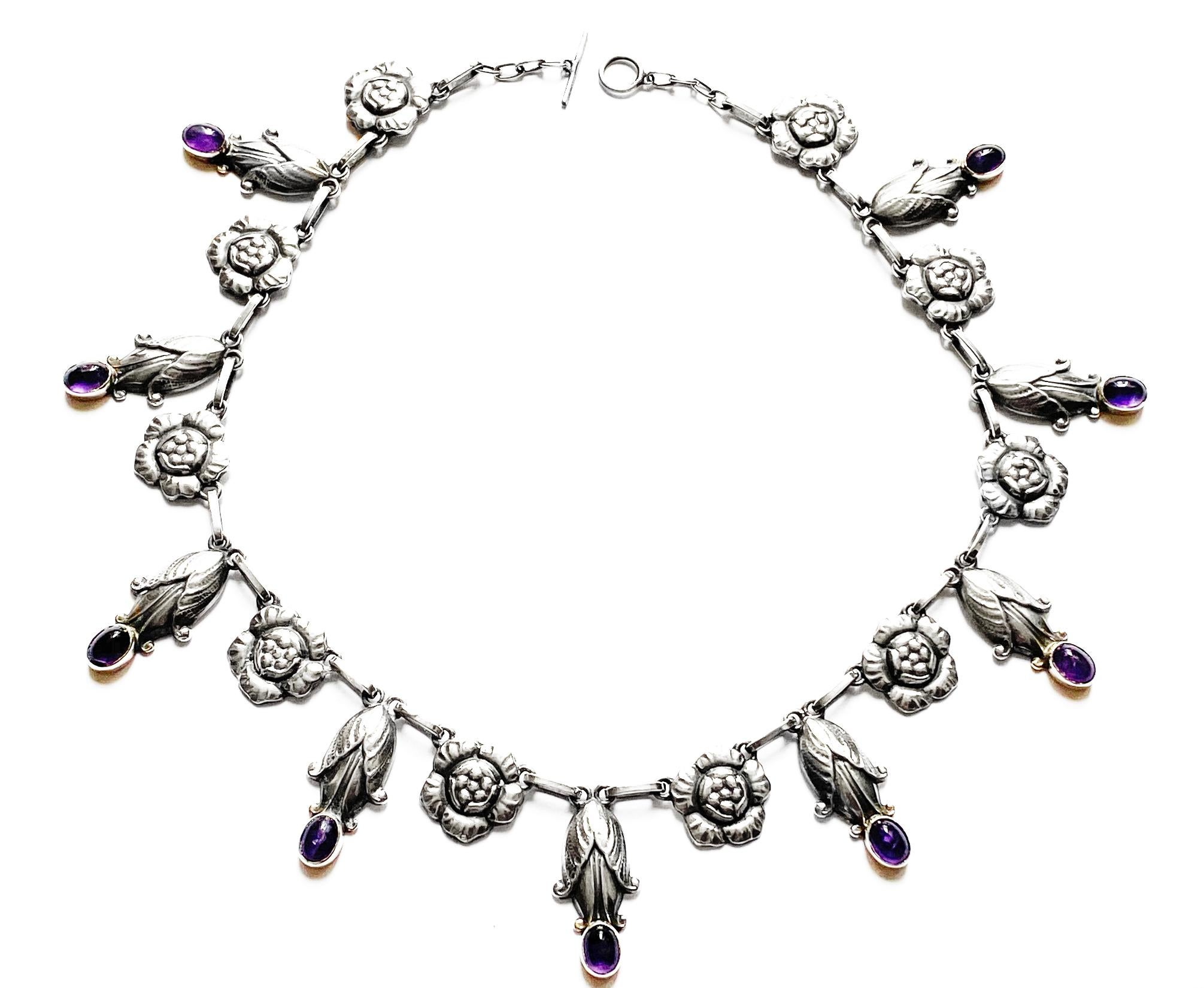 Georg Jensen rare design sterling amethyst necklace C.1930, design No. 6. The Necklace composed of rosette leaf and drop bud motifs. Length: 18.00 inches. Item Weight: 56.7 grams. Marks for Georg Jensen, GJ, 925 Sterling Denmark, 6.