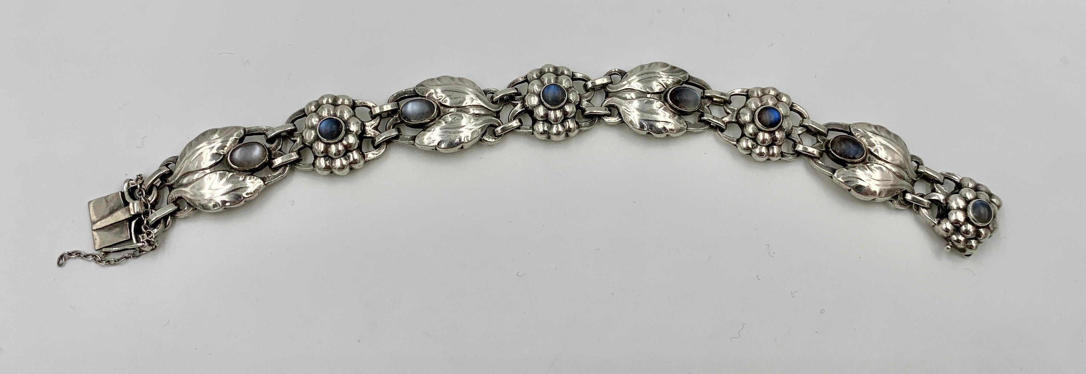 A rare Georg Jensen Moonstone Bracelet Number 3 with the early GJ mark dating the piece to 1933-1944.   A very special bracelet and very rare to find with Moonstones and from the Arts and Crafts Period.
The bracelet has beautiful patina on the