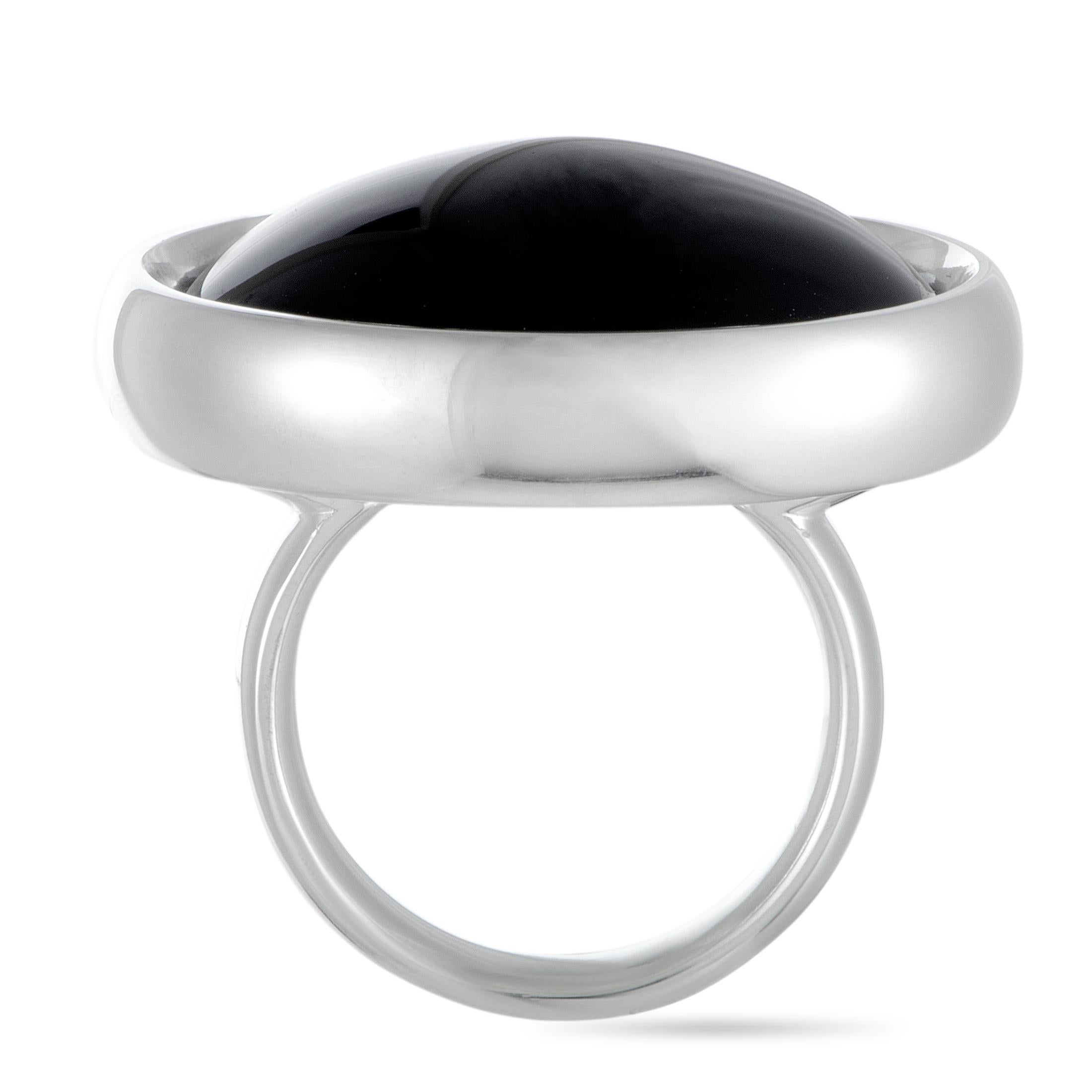 The Georg Jensen “Regitze” ring is made of sterling silver and set with a black agate. The ring weighs 18.2 grams, boasting band thickness of 4 mm and top height of 8 mm, while top dimensions measure 25 by 25 mm.

Offered in brand new condition,