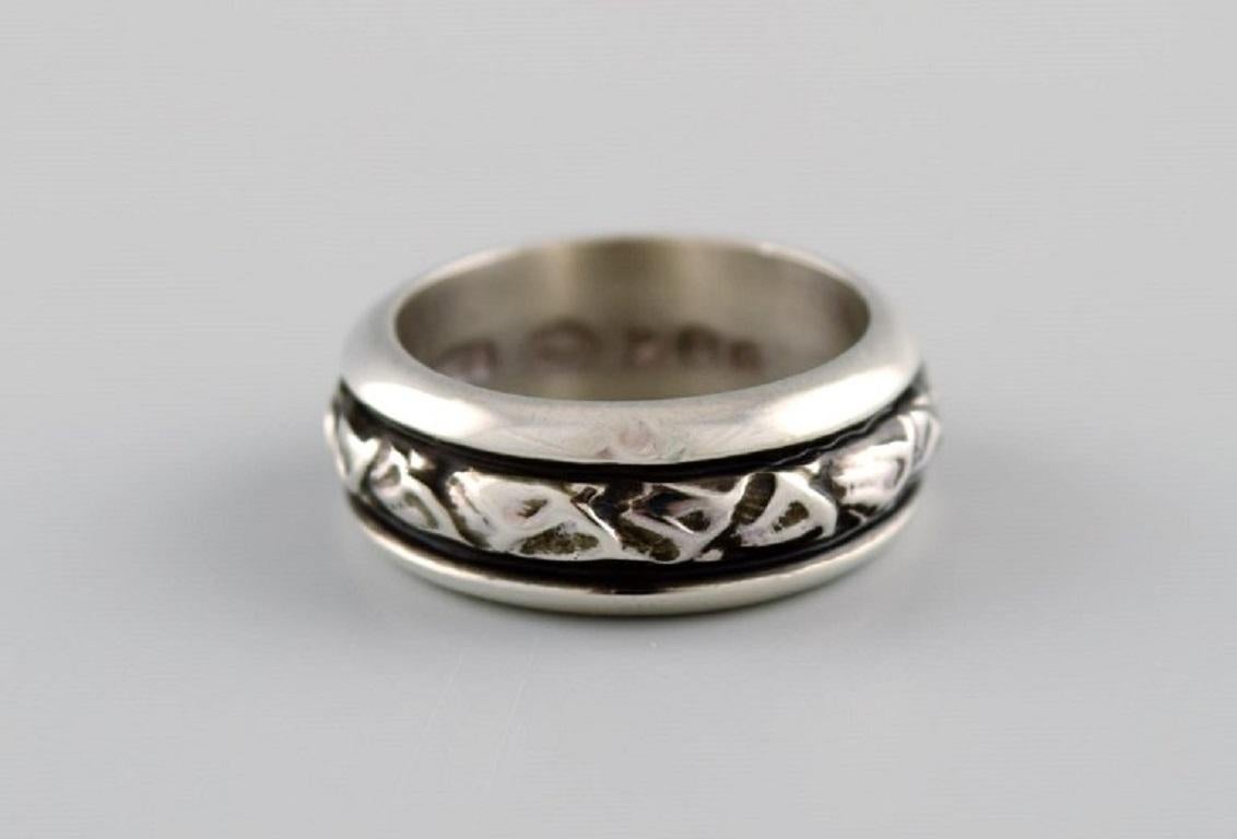 Georg Jensen ring in sterling silver. Model 28C. Late 20th century.
Width: 7 mm.
Diameter: 15.5 mm. 
US size: 4.75.
In excellent condition.
Stamped.
In most cases, we can change the size for a fee (50 USD) per ring.