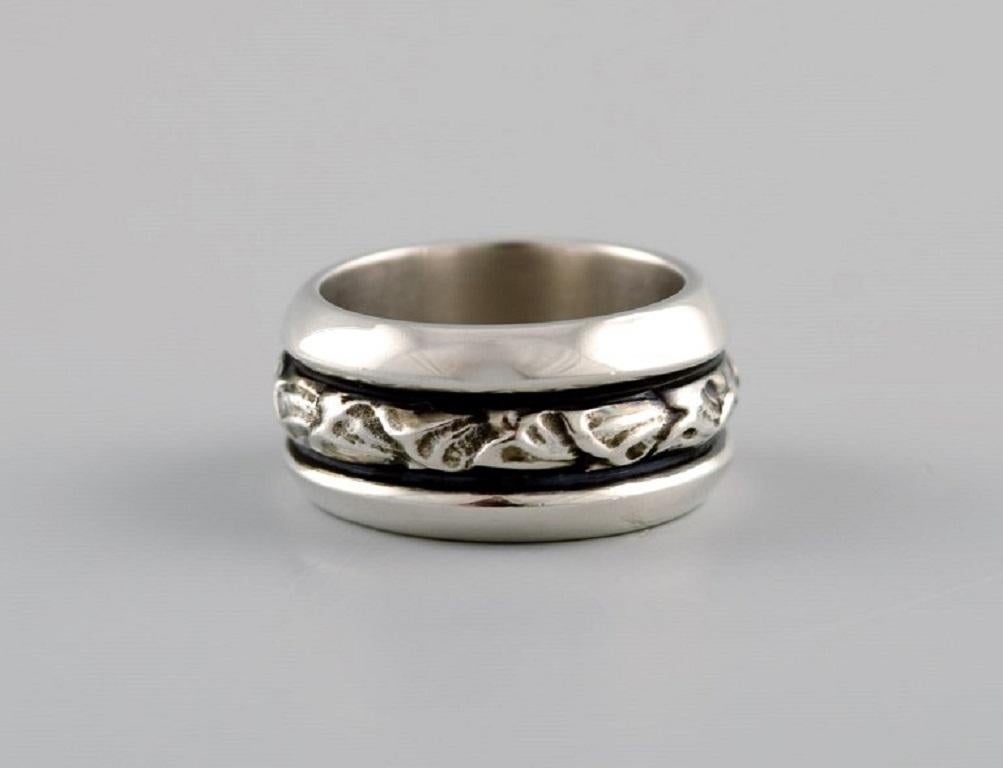 Georg Jensen ring in sterling silver. Model 28D. Late 20th century.
Width: 10 mm.
Diameter: 15.5 mm. 
US size: 4.75.
In excellent condition.
Stamped.
In most cases, we can change the size for a fee (50 USD) per ring.