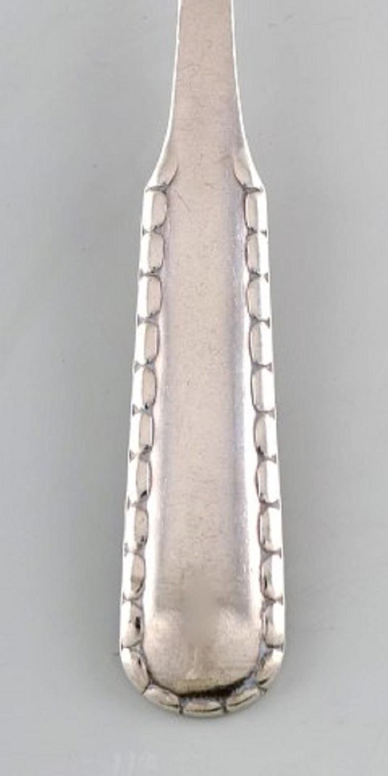 Georg Jensen Rope dinner fork in silver, 1915-1930.
Measures: 19.5 cm.
In very good condition.
Early stamp.
7 pieces in stock.