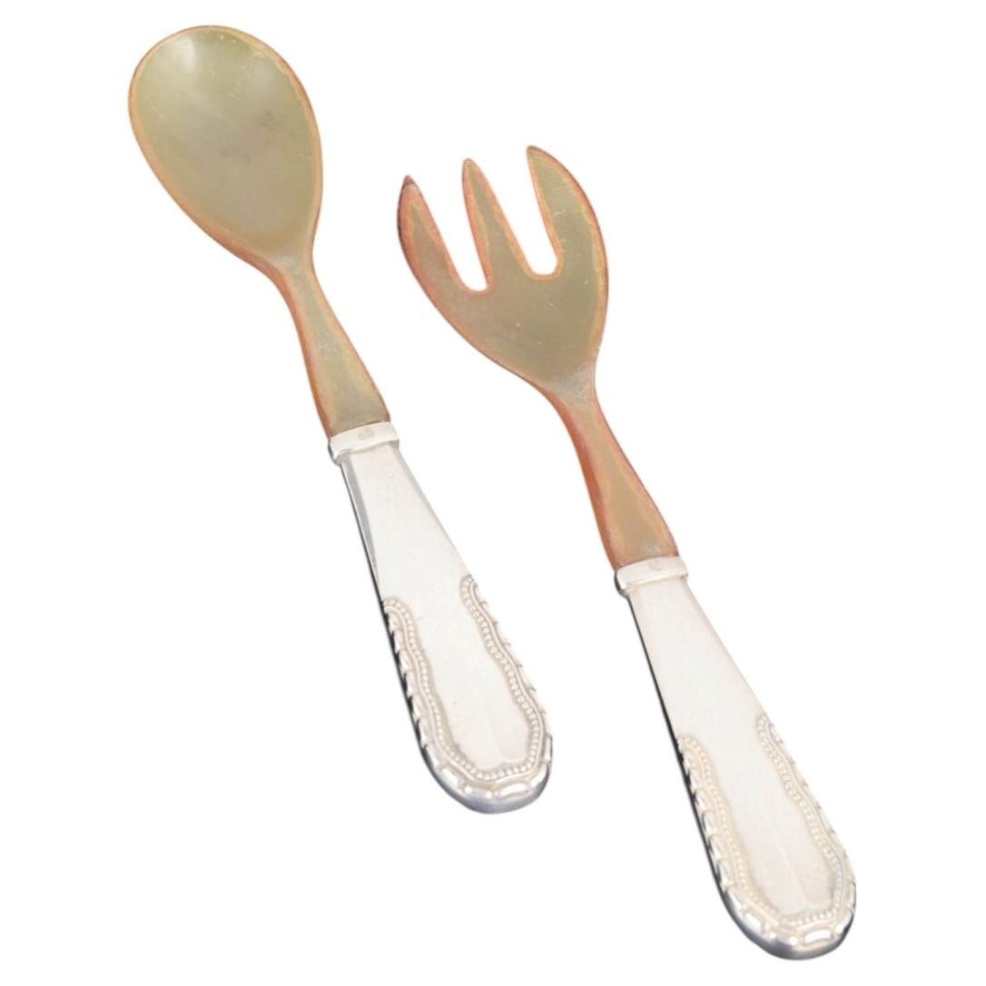 Georg Jensen. Salad set in silver and bone, with handles in the Viking pattern. For Sale