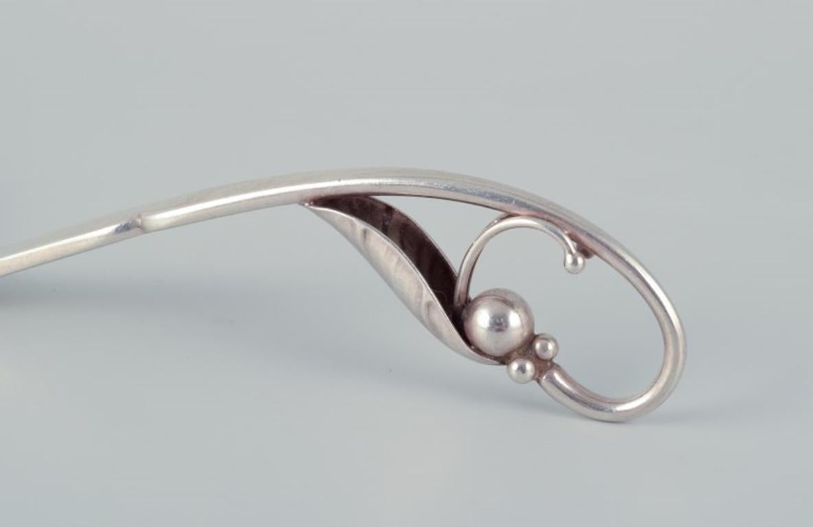 Art Nouveau Georg Jensen serving fork with openwork foliage. Sterling silver. For Sale