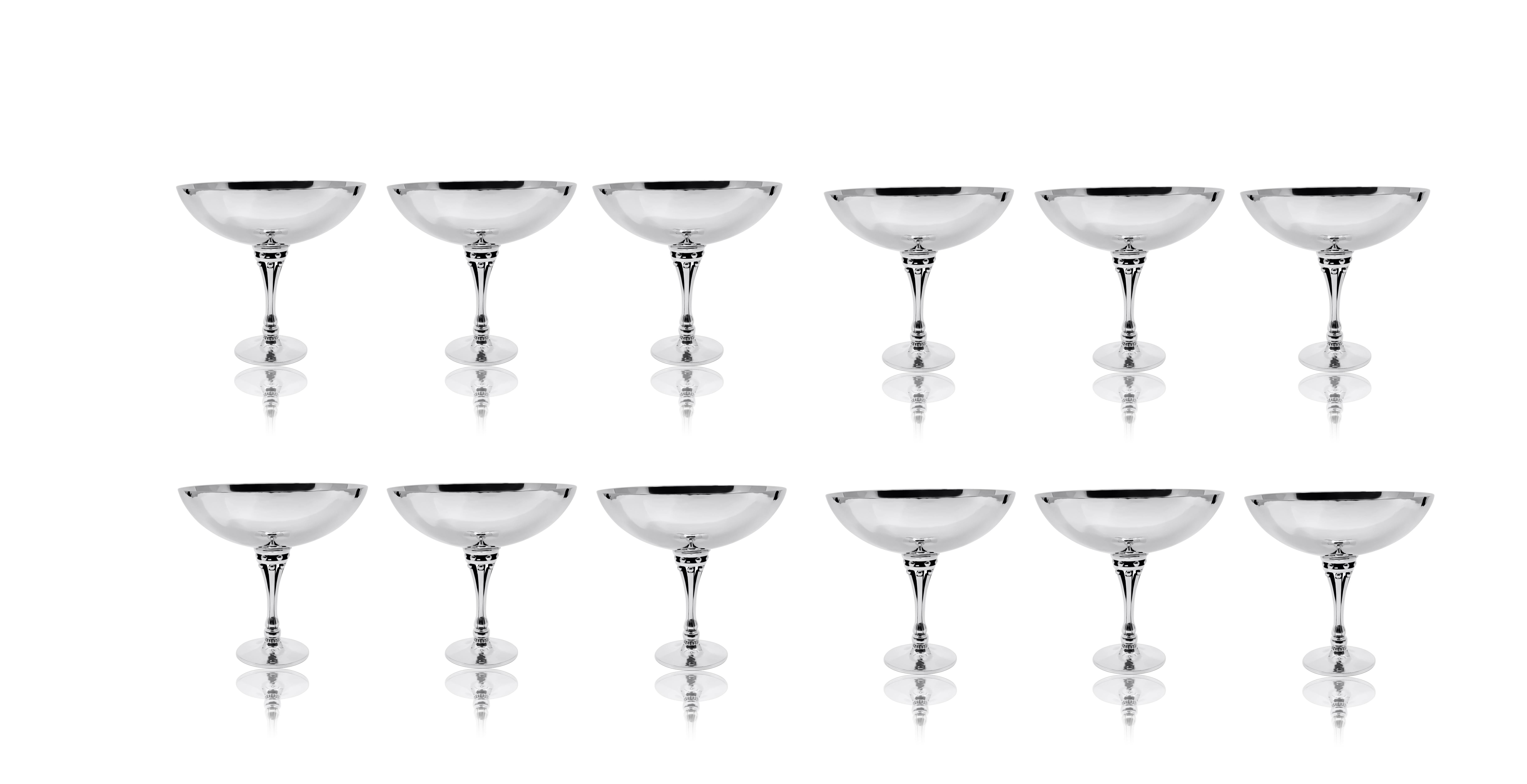 A rare set of 12 sterling silver Georg Jensen Art Deco champagne/dessert cups, Design #532D by Harald Nielsen, dating from 1928. These cups showcase a simple yet elegant Art Deco aesthetic from the designer behind the iconic Pyramid silverware