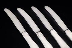 Georg Jensen. Set of four fruit knives in stainless steel and sterling silver.