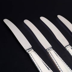 Georg Jensen, 4er-Set Messer aus Silber und Edelstahl. Perlenmuster.