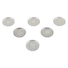 Georg Jensen, juego de seis posavasos de cristal en plata de ley.