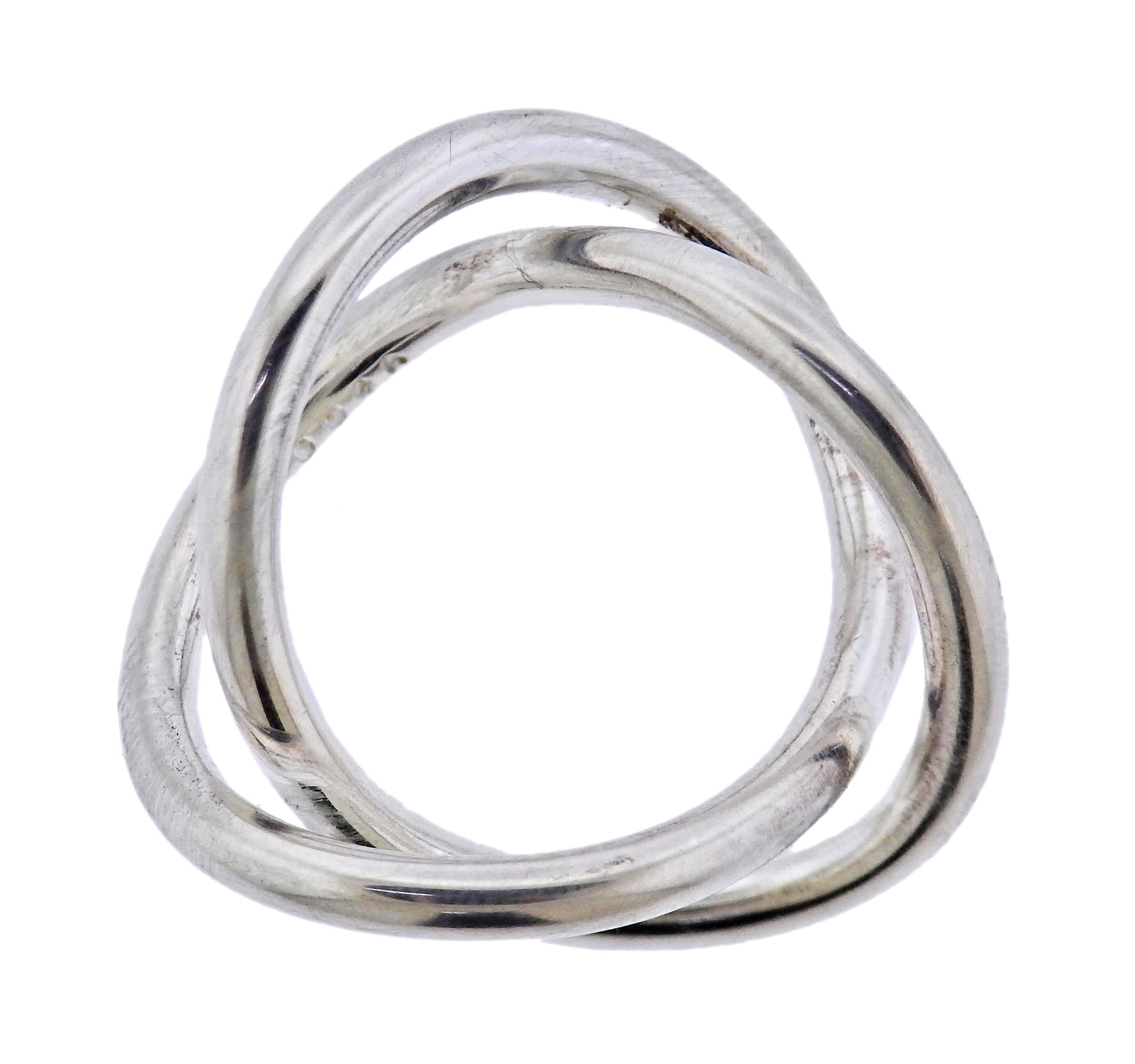 Brand new Georg Jensen sterling silver Alliance ring. Ring is 11mm wide. Available in size  3 (6). Model # 35589802. Marked: GJ 925 S, 554 A. Weight - 6.8 grams.