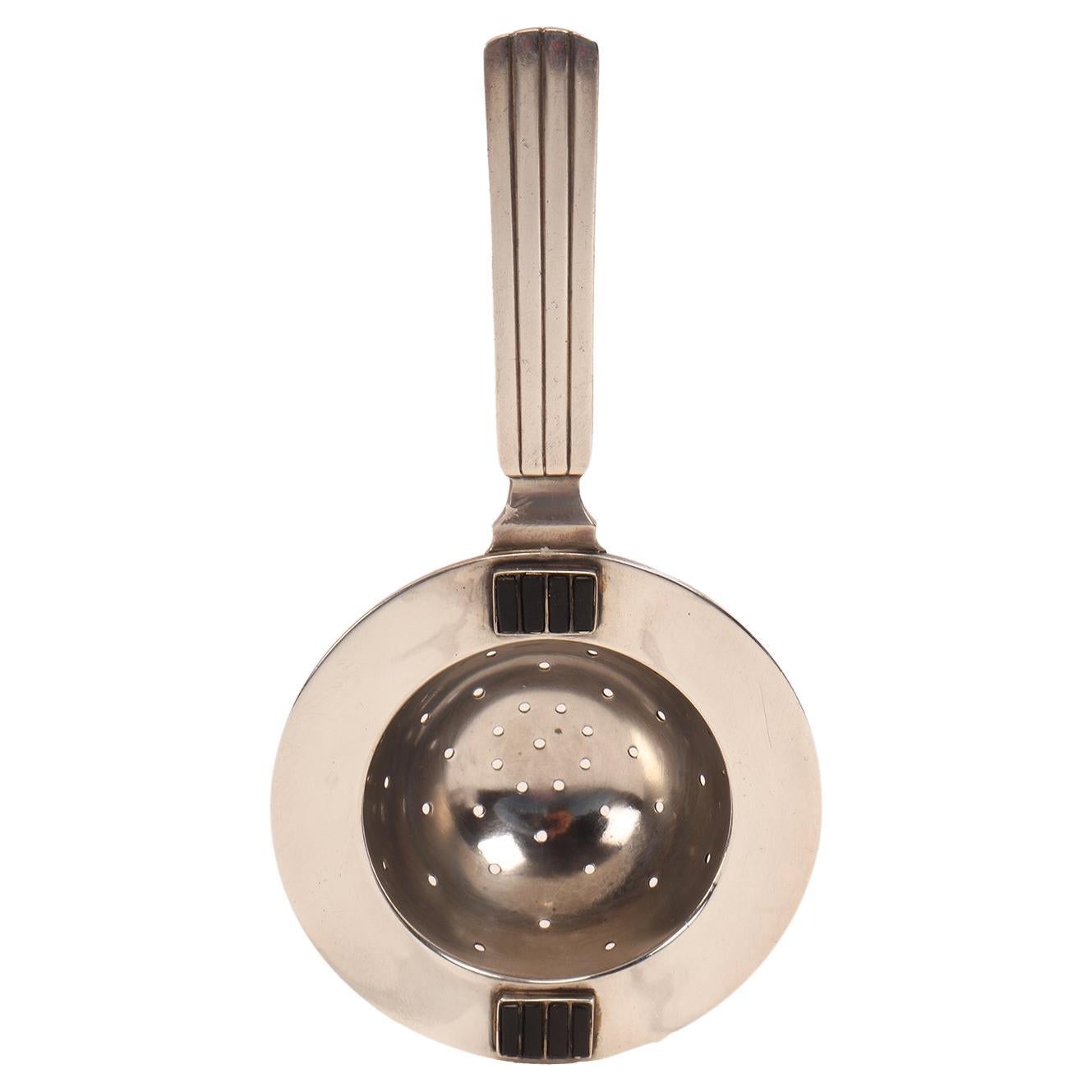 Georg Jensen silver and enamels tea strainer, Denmark 1930. For Sale