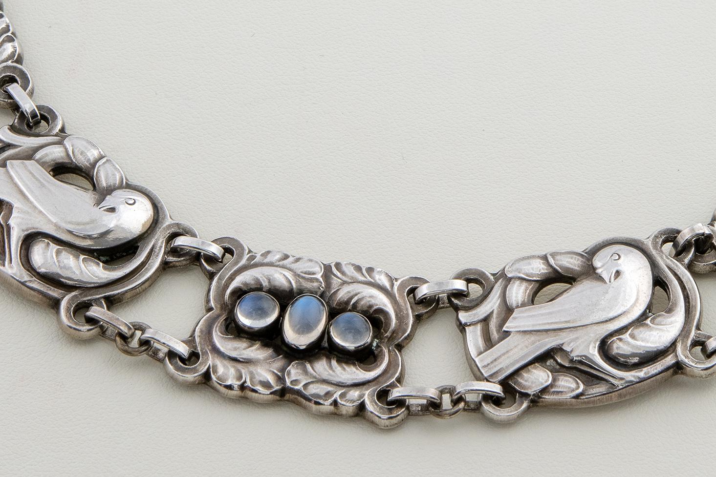 Georg Jensen Sterling Silver and moonstones 'Dove' Necklace No. 17. 

Originally designed by Georg Jensen in 1914.
(Post 1945 stamps)
