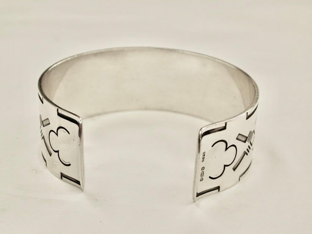 Georg Jensen Silver Cuff Bangle Dated 1964 London Assay
Very heavy quality bangle with a symetrical Aztec design cut into it.
Made by Georg Jensen Ltd of Copenhagen with import hallmarks of 925 standard silver.
Design No 64
