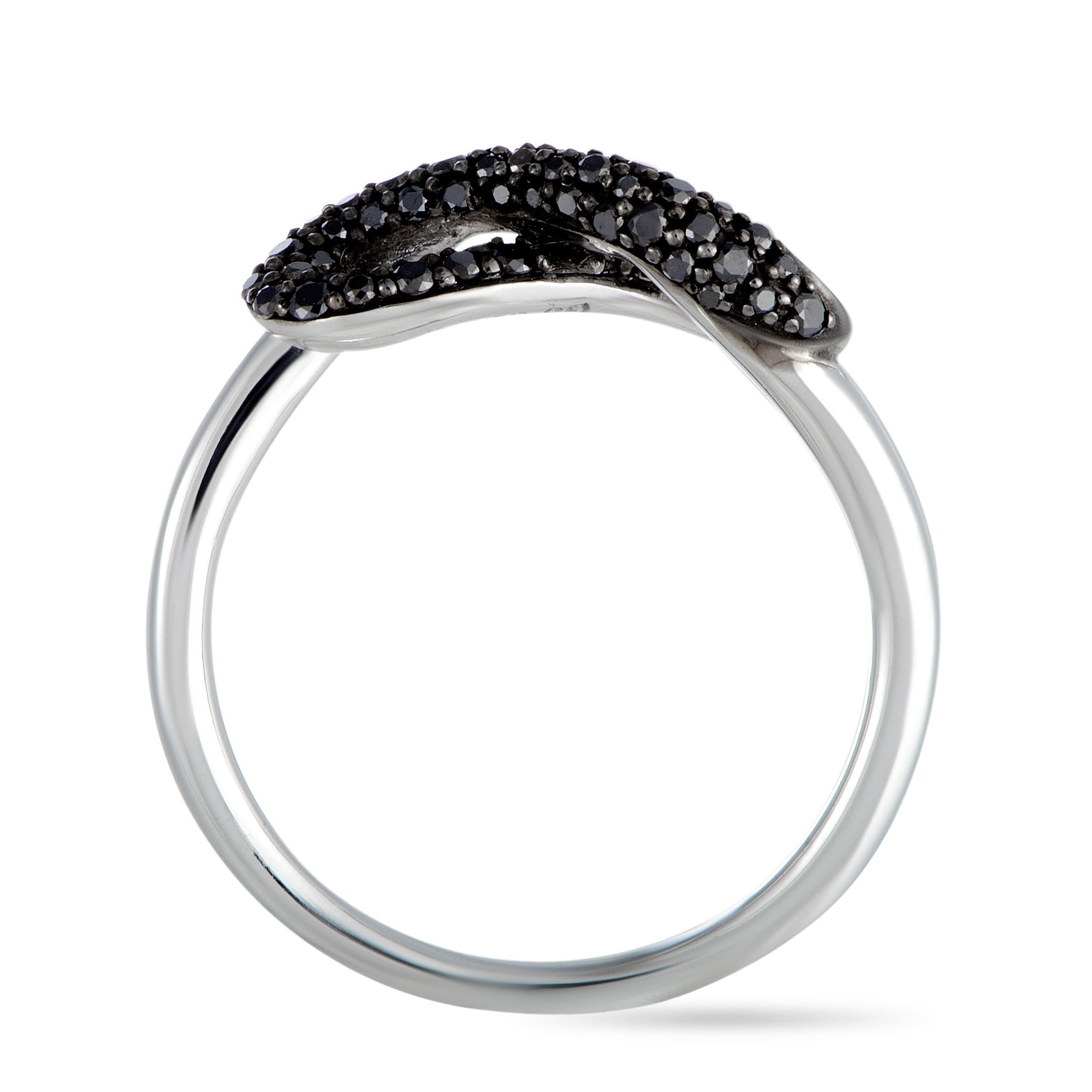 This Georg Jensen ring is made out of silver and black diamonds that amount to 0.26 carats. The ring weighs 2 grams, boasting band thickness of 2 mm and top height of 5 mm, while top dimensions measure 5 by 15 mm.

Offered in brand new condition,